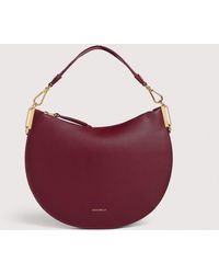 Coccinelle - Schultertasche Aus Genarbtem Leder Sunup Medium - Lyst