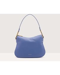 Coccinelle - Grained Leather Shoulder Bag Magie Soft Small - Lyst