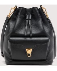 Coccinelle - Grained Leather Bucket Bag Beat Generation Medium - Lyst
