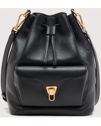 Coccinelle - Grained Leather Bucket Bag Beat Generation Medium - Lyst