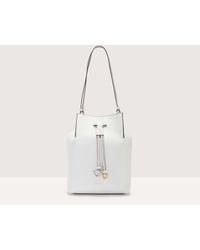 Coccinelle - Cowhide Leather Bucket Bag Roundabout Cowhide Medium - Lyst