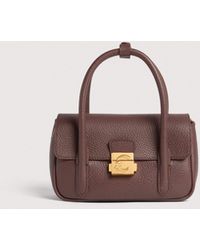 Coccinelle - Grained Leather Minibag C-Me Lock Mini - Lyst