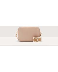 Coccinelle - Grained Leather Crossbody Bag Tebe Small - Lyst
