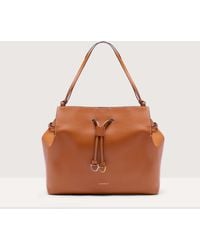 Coccinelle - Cowhide Leather Tote Bag Roundabout Cowhide Large - Lyst