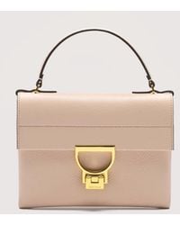 Coccinelle - Grained Leather Clutch Bag Arlettis Mini - Lyst