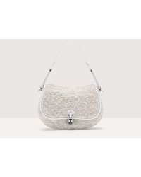 Coccinelle - Laminated Bouclé Fabric Handbag Magie Snowflakes Woven Mini - Lyst