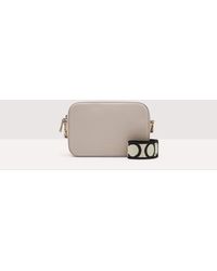 Coccinelle - Grained Leather Crossbody Bag Tebe - Lyst