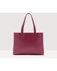 Coccinelle - Borsa shopping in Pelle saffiano Swap Textured Large - Lyst