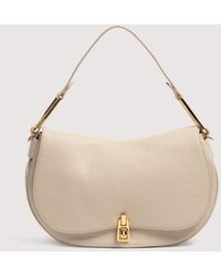 Coccinelle - Grained Leather Handbag Magie Medium - Lyst