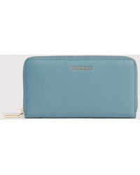Coccinelle - Large Grainy Leather Zip-Around Purse Metallic Soft - Lyst