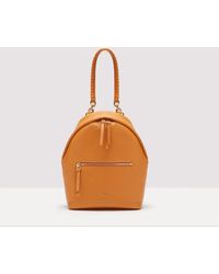 Coccinelle - Grained Leather Backpack Maelody Medium - Lyst