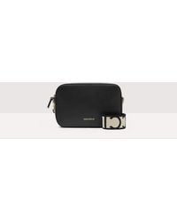 Coccinelle - Grained Leather Crossbody Bag Tebe Small - Lyst