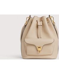 Coccinelle - Grained Leather Bucket Bag Beat Generation Medium - Lyst