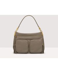 Coccinelle - Grained Leather Handbag Hyle Medium - Lyst