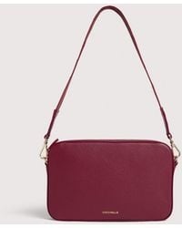 Coccinelle - Grained Leather Crossbody Bag Tebe Small - Lyst