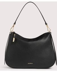 Coccinelle - Grained Leather Hobo Bag Nory Medium - Lyst