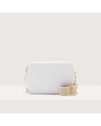 Coccinelle - Grained Leather Crossbody Bag Tebe Medium - Lyst