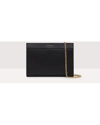Coccinelle - Grained Leather Clutch Bag Newdavy Small - Lyst