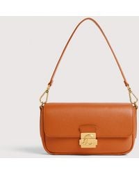 Coccinelle - Grained Leather Shoulder Bag C-Me Lock Medium - Lyst