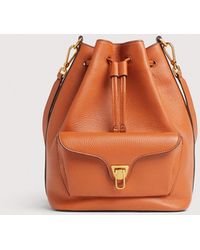 Coccinelle - Grained Leather Bucket Bag Beat Generation Medium - Lyst