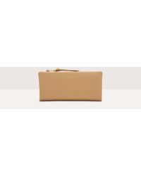 Coccinelle - Large Grained Leather Wallet Softy - Lyst