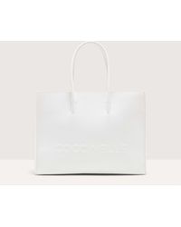 Coccinelle - Grained Leather Handbag Myrtha Maxi Logo Medium - Lyst