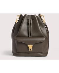 Coccinelle - Grained Leather Bucket Bag Beat Generation Medium - Lyst