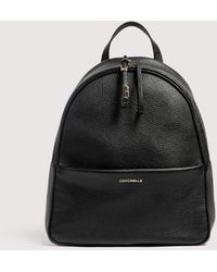 Coccinelle - Grained Leather Backpack Nory Medium - Lyst