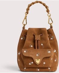 Coccinelle - Suede Bucket Bag With Embroidered Floral Pattern Beat Generation Small - Lyst
