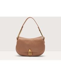 Coccinelle - Grained Leather Handbag Magie Soft Mini - Lyst