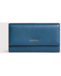 Coccinelle - Large Grainy Leather Purse Metallic Large - Lyst