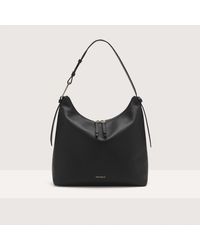 Coccinelle - Grained Leather Shoulder Bag Malory Small - Lyst