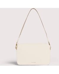 Coccinelle - Grained Leather Crossbody Bag Tebe Small - Lyst