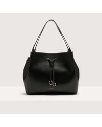 Coccinelle - Borsa shopping in Pelle liscia effetto vacchetta Roundabout Cowhide Large - Lyst