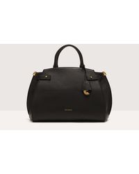 Coccinelle - Grained Leather Handbag Klichè Medium - Lyst