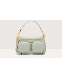Coccinelle - Grained Leather Handbag Hyle Small - Lyst