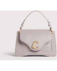 Coccinelle - Grained Leather Handbag C-Me Small - Lyst