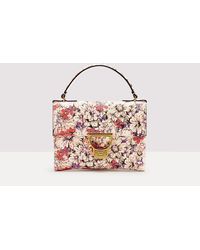 Coccinelle - Clutch in Pelle con stampa floreale Arlettis Flower Print Mini - Lyst
