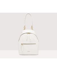Coccinelle - Grained Leather Backpack Maelody Medium - Lyst