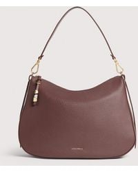 Coccinelle - Grained Leather Hobo Bag Nory Medium - Lyst
