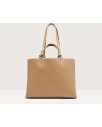 Coccinelle - Grained Leather Handbag Hop On Medium - Lyst