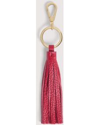 Coccinelle - Grained Leather And Metal Key Ring Tassel - Lyst