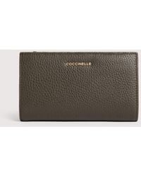 Coccinelle - Medium Grained Leather Wallet Metallic Large - Lyst