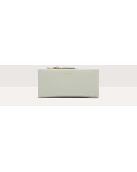 Coccinelle - Large Grained Leather Wallet Softy - Lyst