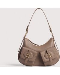 Coccinelle - Grained Leather Shoulder Bag Mavery Pocket Small - Lyst