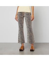 Ganni - Leopard-Print Cotton-Blend Denim Jeans - Lyst