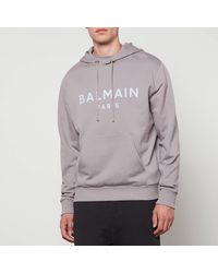 Balmain - Logo-Print Cotton-Jersey Hoodie - Lyst