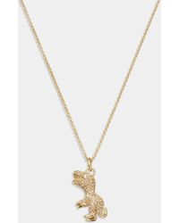 COACH - Rexy Pendant Crystal And Gold-tone Necklace - Lyst