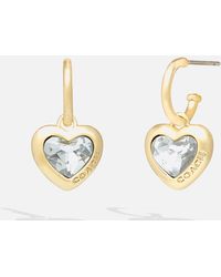 COACH - Crystal Heart Logo Drop Huggie Hoop Earrings - Lyst