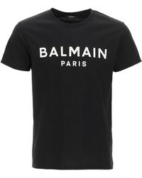 Balmain T-shirt bianca in cotone con logo Balmain floccato nero Bianco/Nero  | T-Shirt Donna « Melisaramet